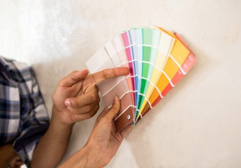 Professional color consultation featuring vibrant paint swatches to help you Paint It Right for your next home renovation.